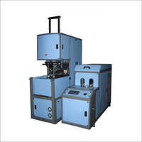 Semi Automatic PET Blow Molding Machine - 1-5 Litre, 1100 BPH Production Capacity, White Color, 3 Phase Power, 2 Cavity Design, Warranty Included