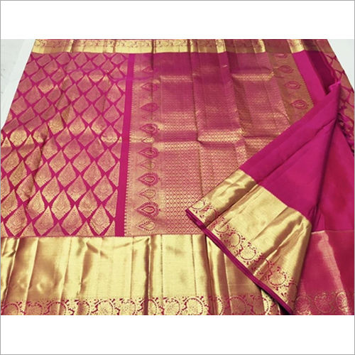 Green intricate buttas kancheepuram silksaree, contrast zari-rich pallu  features jaal & border of intricate zari designs