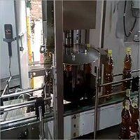 Filling and Capping Machine For Mustard Oil Edible Oil Lubricant Oil