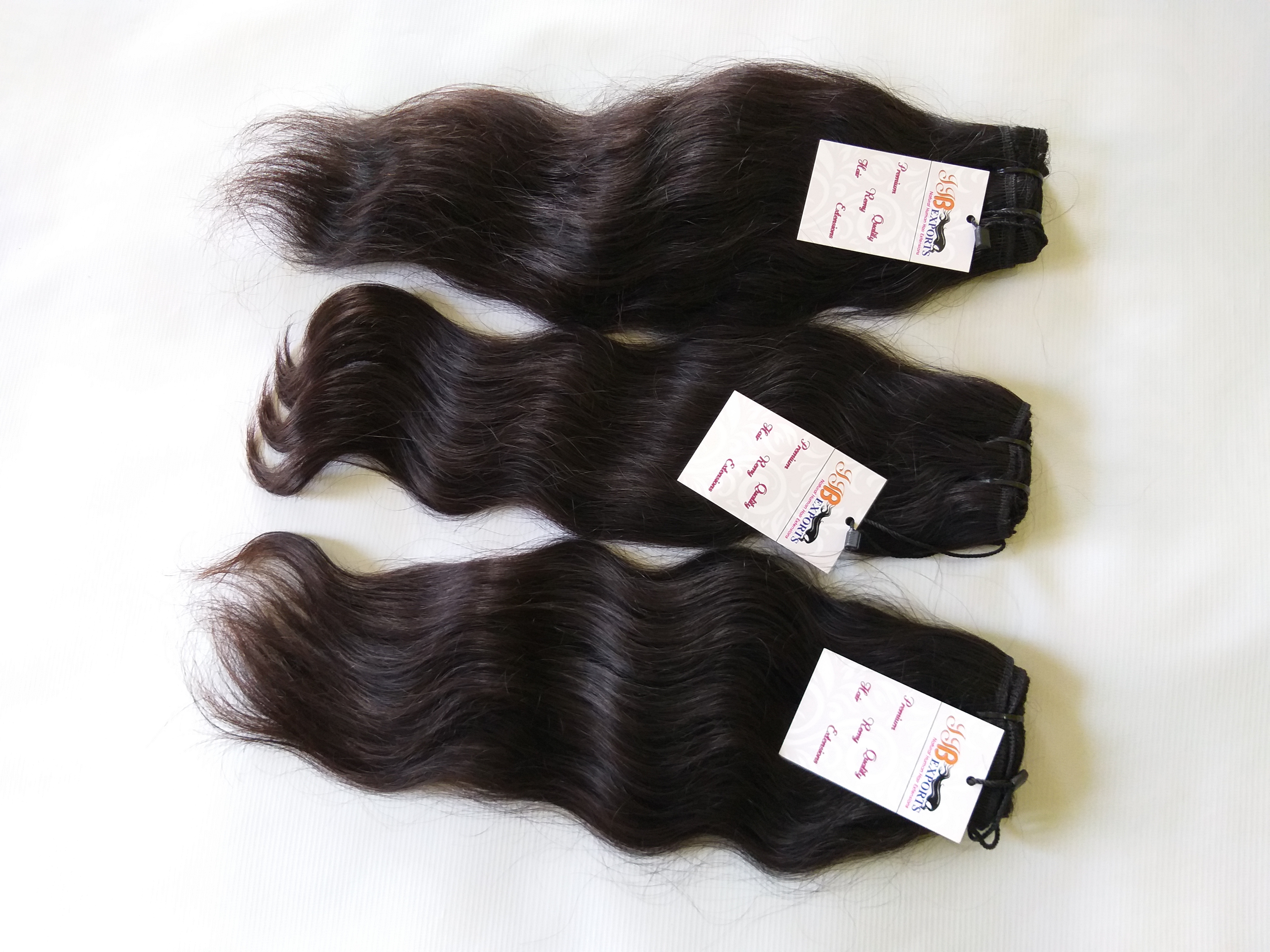 Soft & Silky Natural Raw Unprocessed Wavy Human Hair Extensions