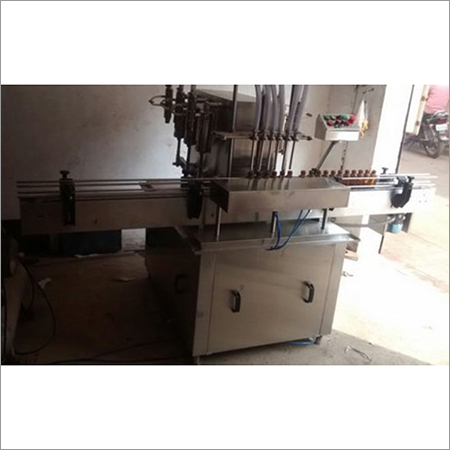 Four Head Volumetric Liquid Filling Machine