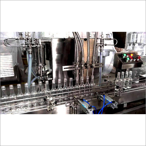 4 Head Bottle Filling Machine