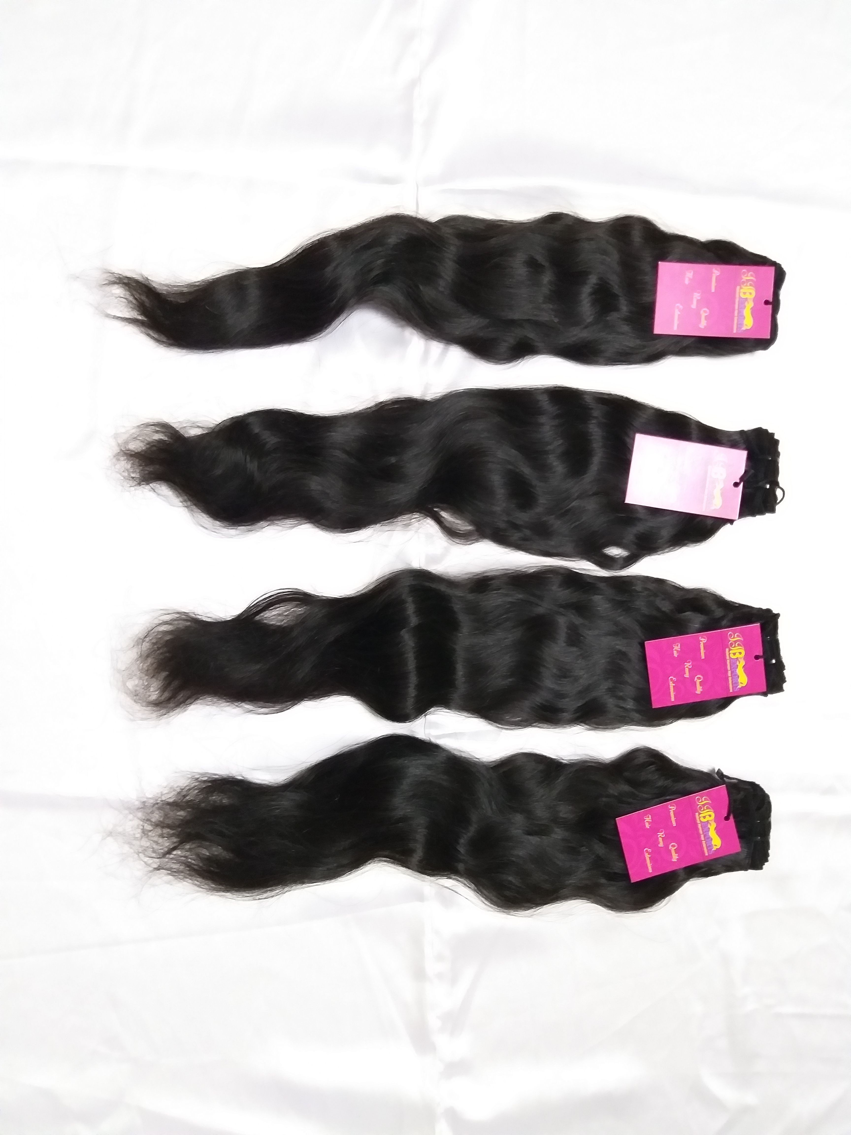 Indian Virgin Raw Human Wavy Hair Machine Wefted Hair Remy Bundles