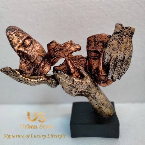 Three Face Mask Sculpture