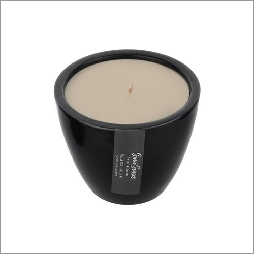 White Scented Candle In Black Ceramic Jar