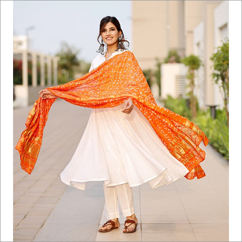 Ladies Bright White Flared Kurta Set With Bandhej Dupatta