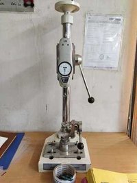 Button snap pull tester
