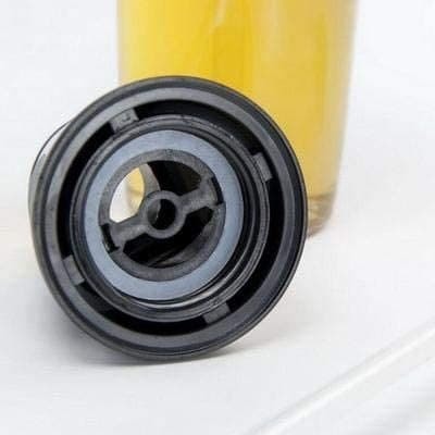 OIL DISPENSER WITH PRESS