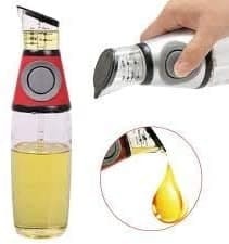 OIL DISPENSER WITH PRESS
