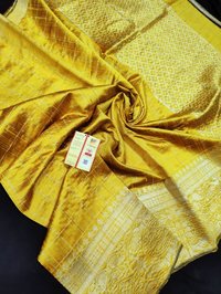 Pure raw silk jari checks woven saree with beautifull floral border ,jala pallu .