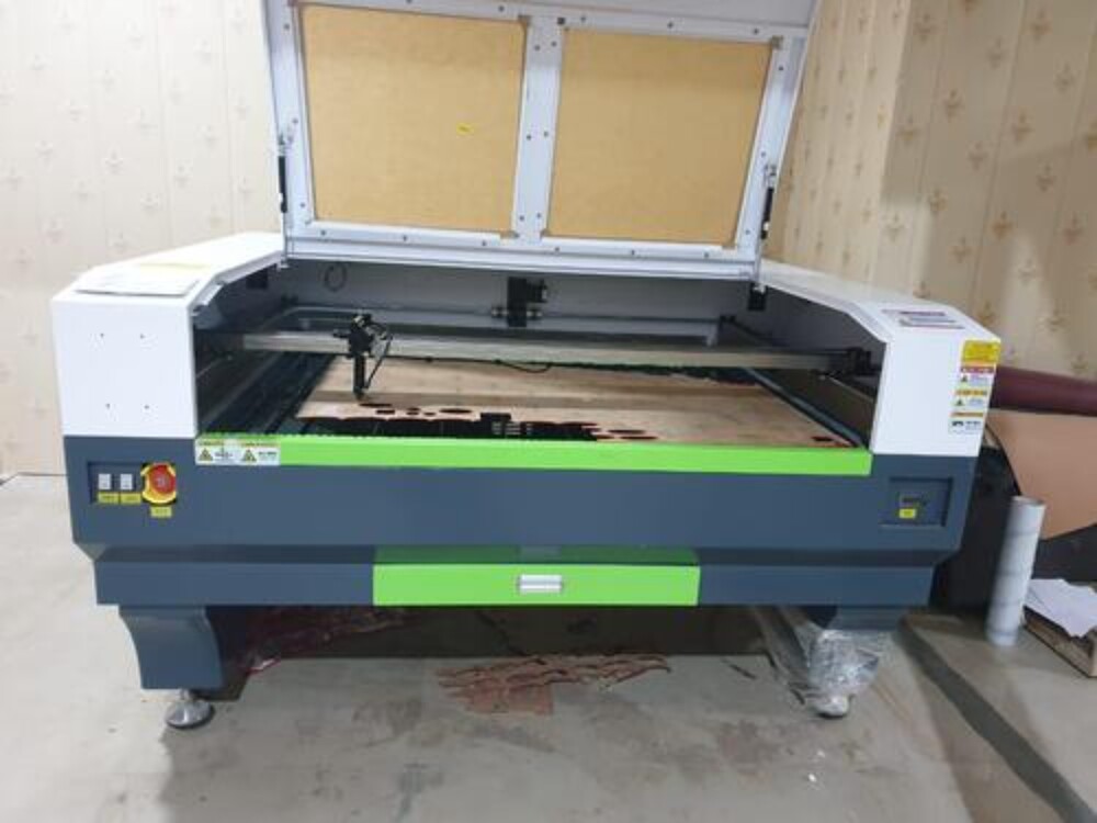 CO2 Laser Cutting Machine - Heavy Duty, Semi-Automatic CNC with 220V/110V Input | Ideal for Metal Signage, Advertising, Garment Manufacturing