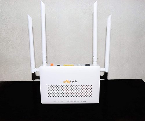 Syrotech 2010 WDAONT Wont GPON ONU Wireless Router Optical Network Unit With 4 Antenna 1200 Mbps Router  (White, Dual Band)