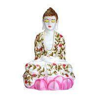 Meditating Buddha Statue Sitting On Lotus