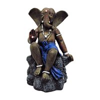 Ganpati Statue Sitting On Rock