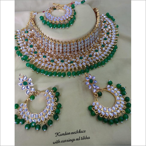 Heavy Kundan Rhinestone And Green Pearls Bridal Necklace Set With Maang Tikka