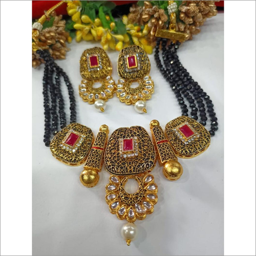 Kundan Pearl & Onyx Stylish Mangalsutra With Earrings By PEGASI GEMS & JEWELLERS