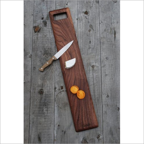 Brown Chopping Board With Knife Attached
