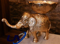 Engraved decorative elephants made in metal with carved bowls