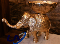 Engraved decorative elephants made in metal with carved bowls