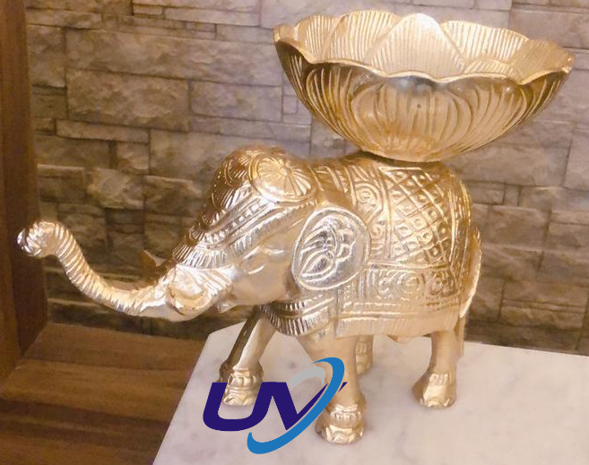 Engraved decorative elephants made in metal with carved bowls