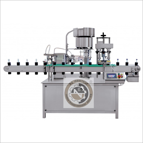 Automatic Monoblock Filling and Capping Machine For Viral Transport Medium Kits By N K INDUSTRIES