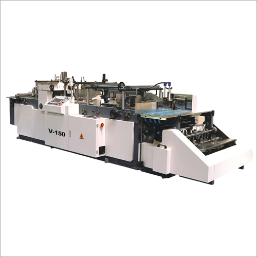 Automatic Book Jacketing and Strapping Machine