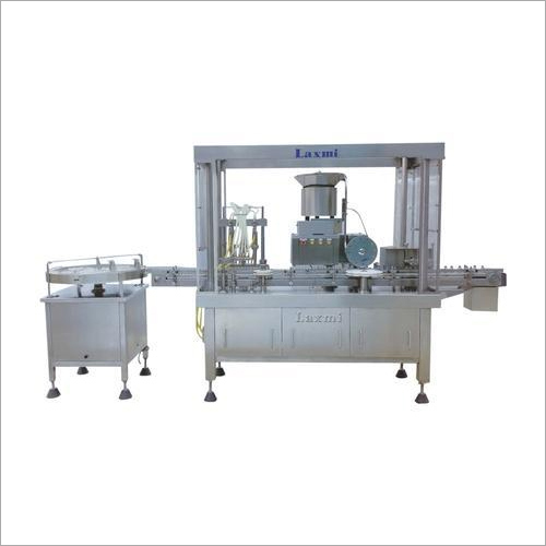Vial Filling And Stoppering Machine