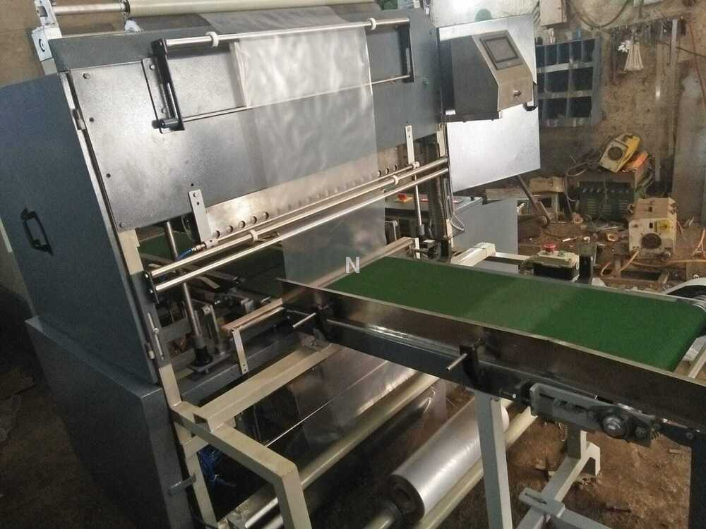 Automatic Hi-Speed Shrink Packaging Machine