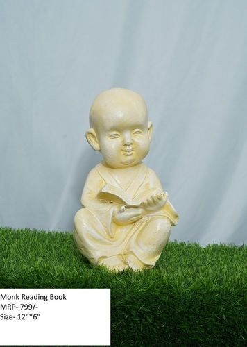 White Monk Reading Book Statue