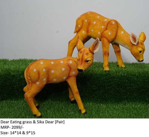 Brown Dear Eating Grass And Sika Dear