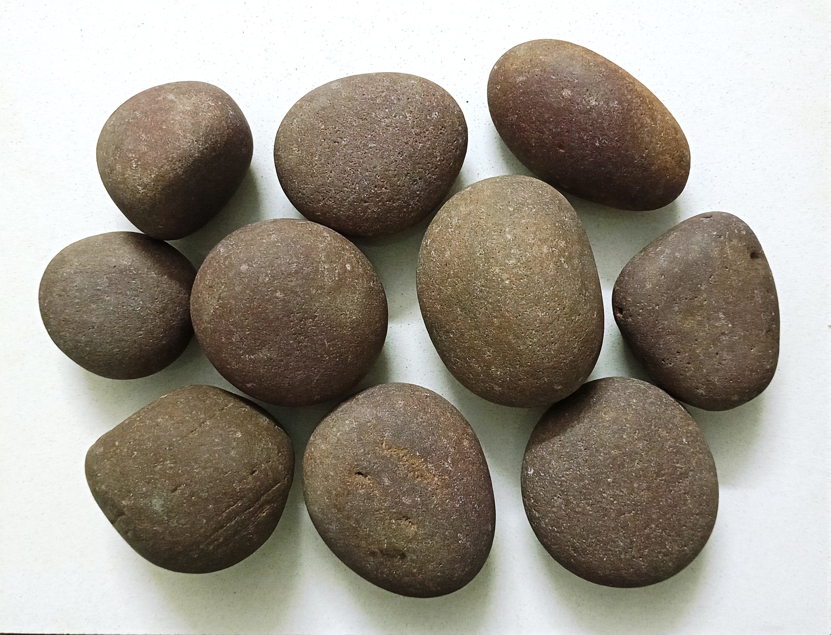 Brown Red Round Stepping Stone and flat big rock stone pebbles supplier in India