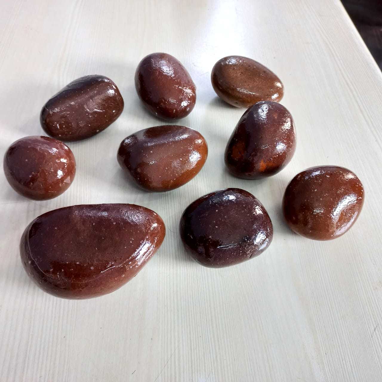 Manufacturer of good Polished Jet Black normal Polish Pebbles stone for export in bulk quantity