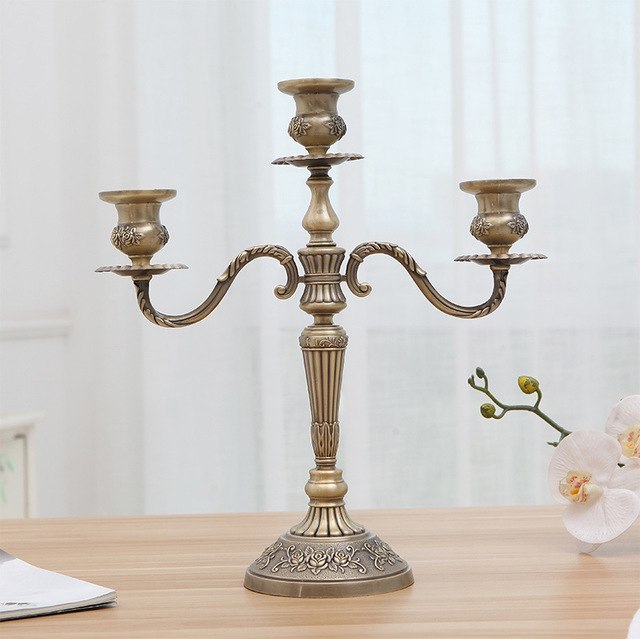 VINTAGE BRASS WHITE AND GOLDEN CANDLE HOLDER
