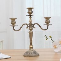 VINTAGE BRASS WHITE AND GOLDEN CANDLE HOLDER