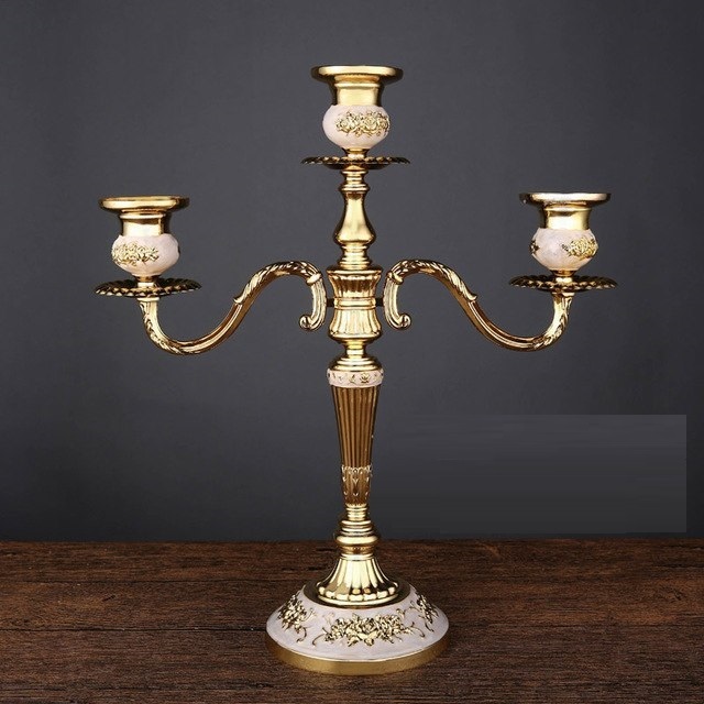 VINTAGE BRASS WHITE AND GOLDEN CANDLE HOLDER