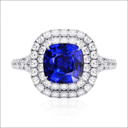 Royal Blue Sapphire And Diamond Engagement Halo Ring