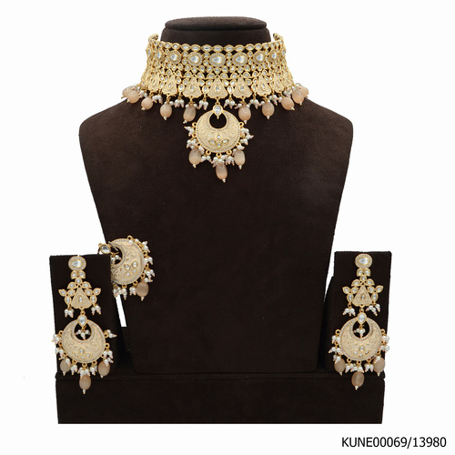 Kundan Choker Necklace Set With Maang Tikka and Light Orange Meenakari Work