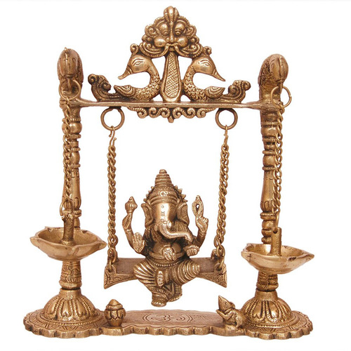 Brass Ganesha Swing with Oil Lamp with Peacock Design