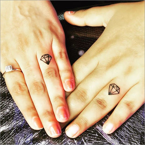 33 Beautiful Wedding Ring Tattoos for NonTraditional Couples