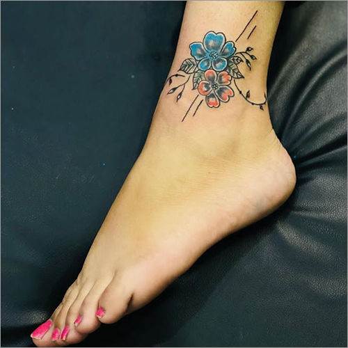 forget me not foot tattoo