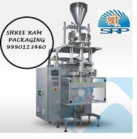 Automatic pouch packaging machine