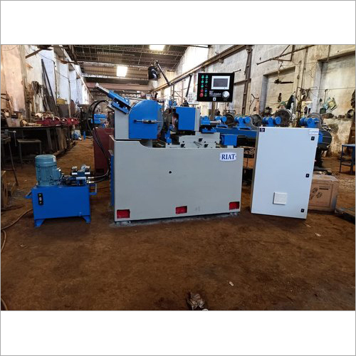CNC Centreless Grinding Machine