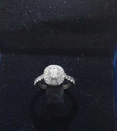 Cushion Solitaire and Round Diamond Engagement Ring