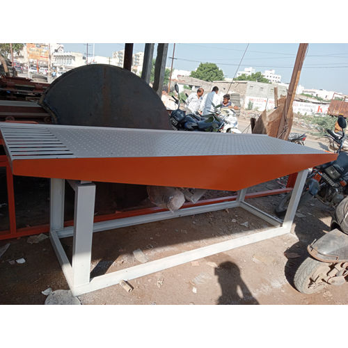 White & Orange Vibrating Table