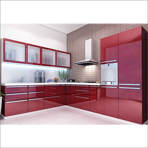 L Shaped Red Modular Kitchen With Tiled Backplash