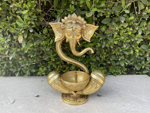 Ganesh statue with akhand diya table top religious hindu god figure