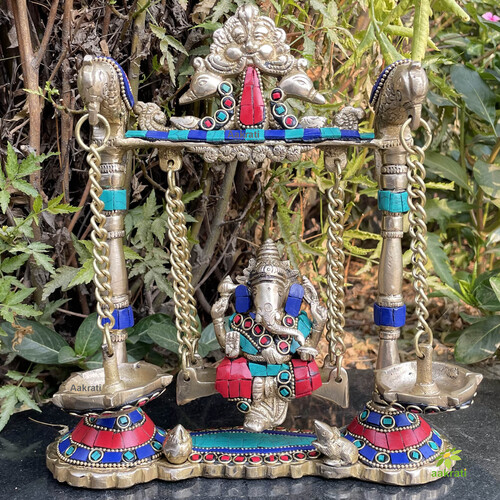 Turquoise work Brass Ganesha Swing with Oil Lamp with Peacock Design with stone work