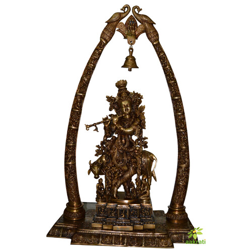 Prabhavaliand Lord Krishna mounted on big Gold frame Temple frame handcrafted .
