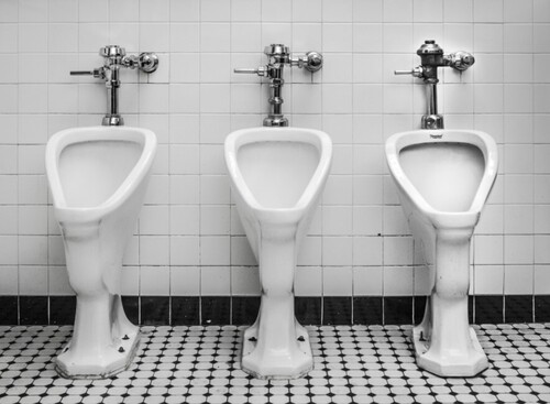 White Public Urinal