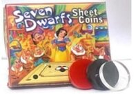 SEVEN DRAFT CARROM MEN WITH STRKERS